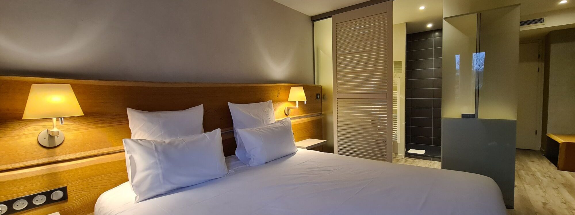 D&eacute;couvrez les chambres et suites de l’H&ocirc;tel Spa Restaurant Jenny Saint-Louis